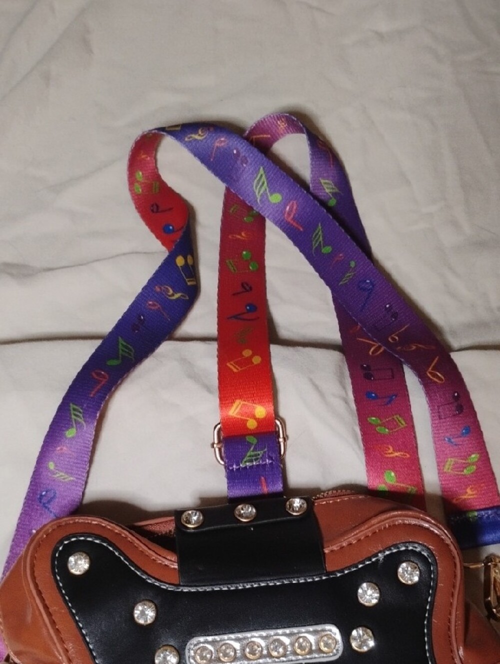 Brown and Black Guitar-Shaped Crossbody Bag with Colorful Strap - Picture 3 of 6